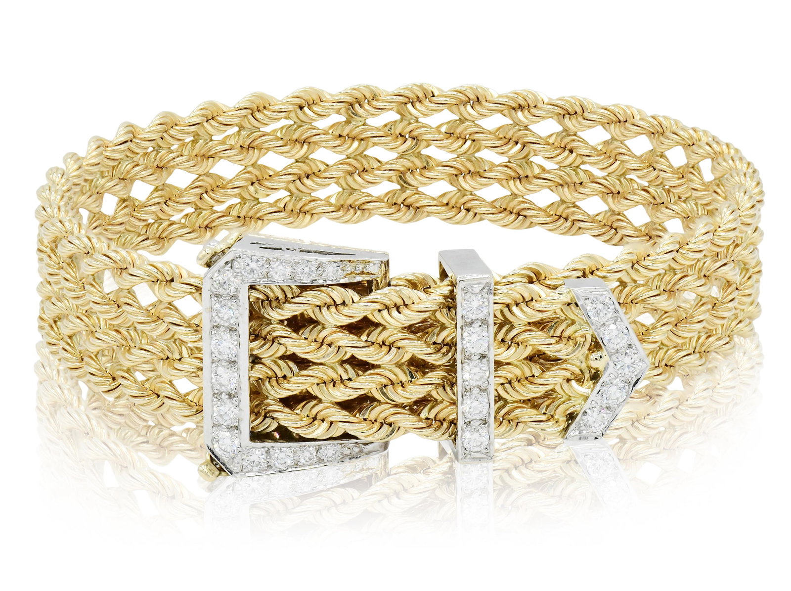 14K Yellow Gold, White Gold & Diamond Belt Buckle Bracelet: 14K Yellow Gold, White Gold & Diamond Belt Buckle Bracelet • set with round brilliant diamonds weighing a total of 0.84 carats • 9 1/4 inches (length) • 32.6 dwt (total weight) Prove
