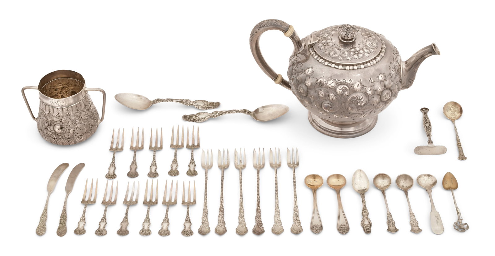 A Group of Assorted Sterling Silver Pieces: A Group of Assorted Sterling Silver Pieces 5 3/5 x 9 3/4 x 6 inches (teapot) 3 1/4 x 4 1/2 x 3 1/4 inches (cup) 6 in. long (spoon) 37.74 troy ounces Other Notes: Fontaine's Auction Gallery can arrange
