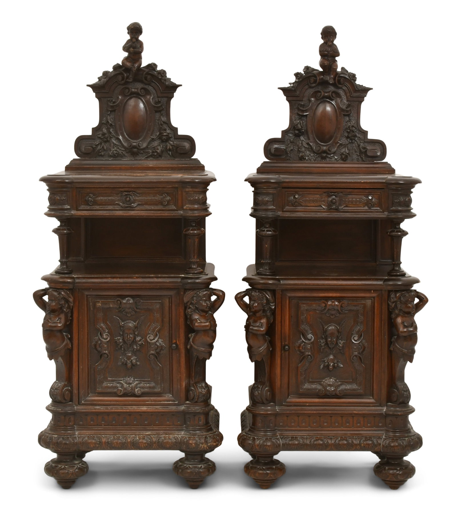 A Pair of Italian Renaissance Revival Walnut Nightstands: A Pair of Italian Renaissance Revival Walnut Nightstands late 19th century 52 x 22 x 15 inches Provenance: Private Collection, South Dakota