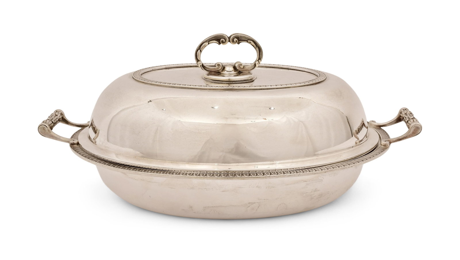 Cartier Sterling Silver Covered Dish, Italy: Cartier Sterling Silver Covered Dish, Italy 20th century marked "Cartier, Inc., Italy, 925, Sterling" 6 x 12 3/4 x 9 inches 39.46 troy ounces Provenance: Private Collection, New York