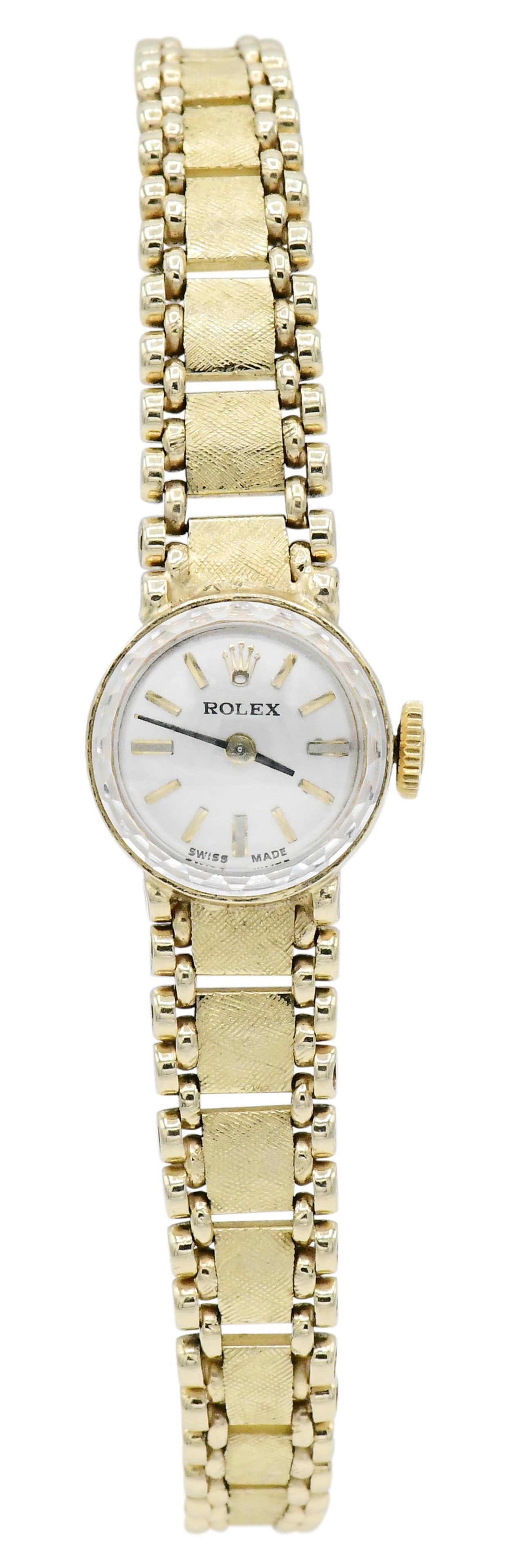 Rolex 14K Yellow Gold Ladies Wrist Watch: Rolex 14K Yellow Gold Ladies Wrist Watch Case: 14K yellow gold Case Diameter: 15mm Dial: silvered Reference: 94734 Movement: 17 jewels, unadjusted Bracelet: 14K yellow gold Signed: case, dial and move