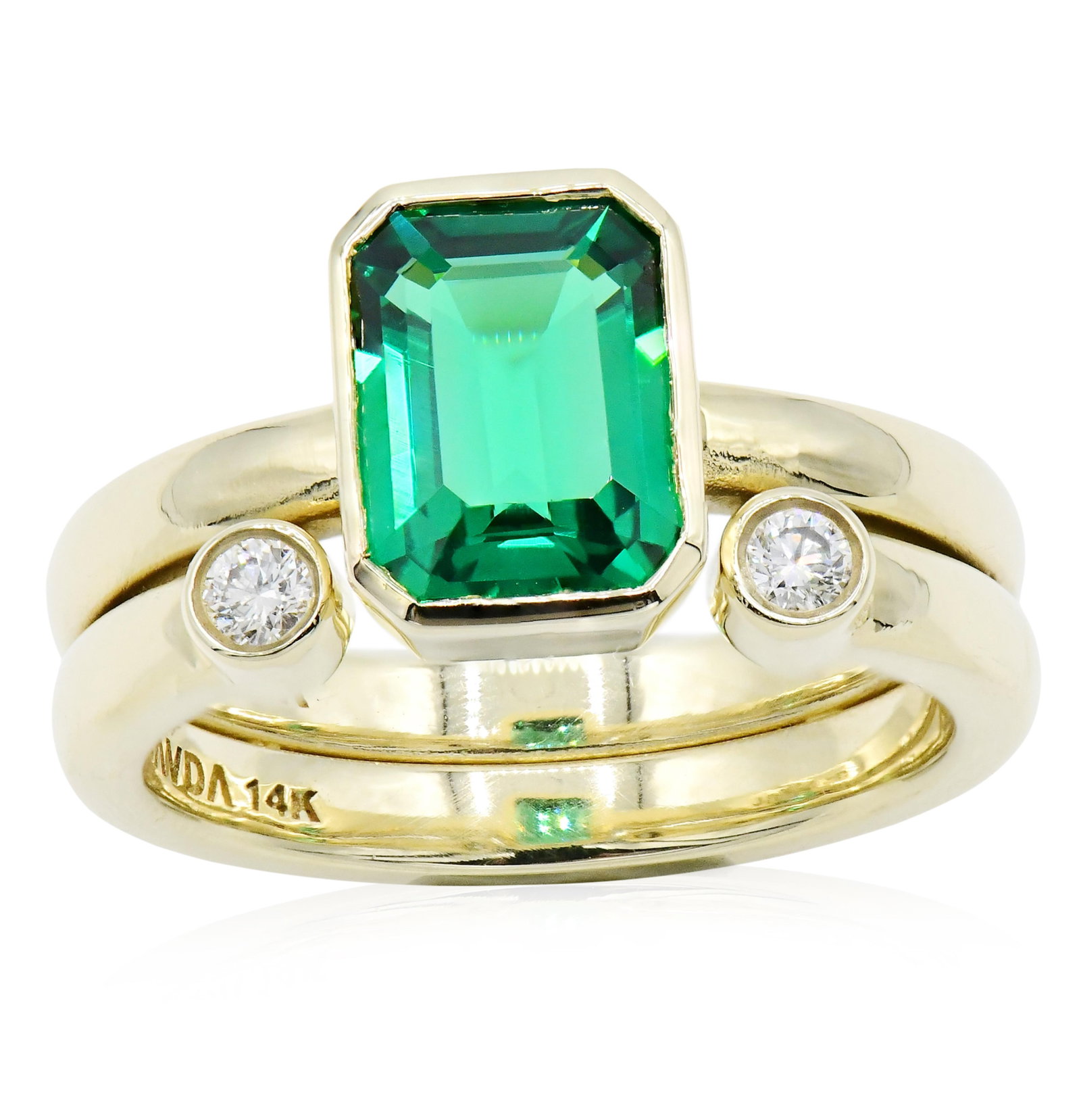 Javda 14K Yellow Gold, Emerald & Diamond Ring: Javda 14K Yellow Gold, Emerald & Diamond Ring • featuring a 1.84 carat emerald cut lab created emerald • accented by round brilliant diamonds weighing a total of 0.10 carats • 7 1/4 