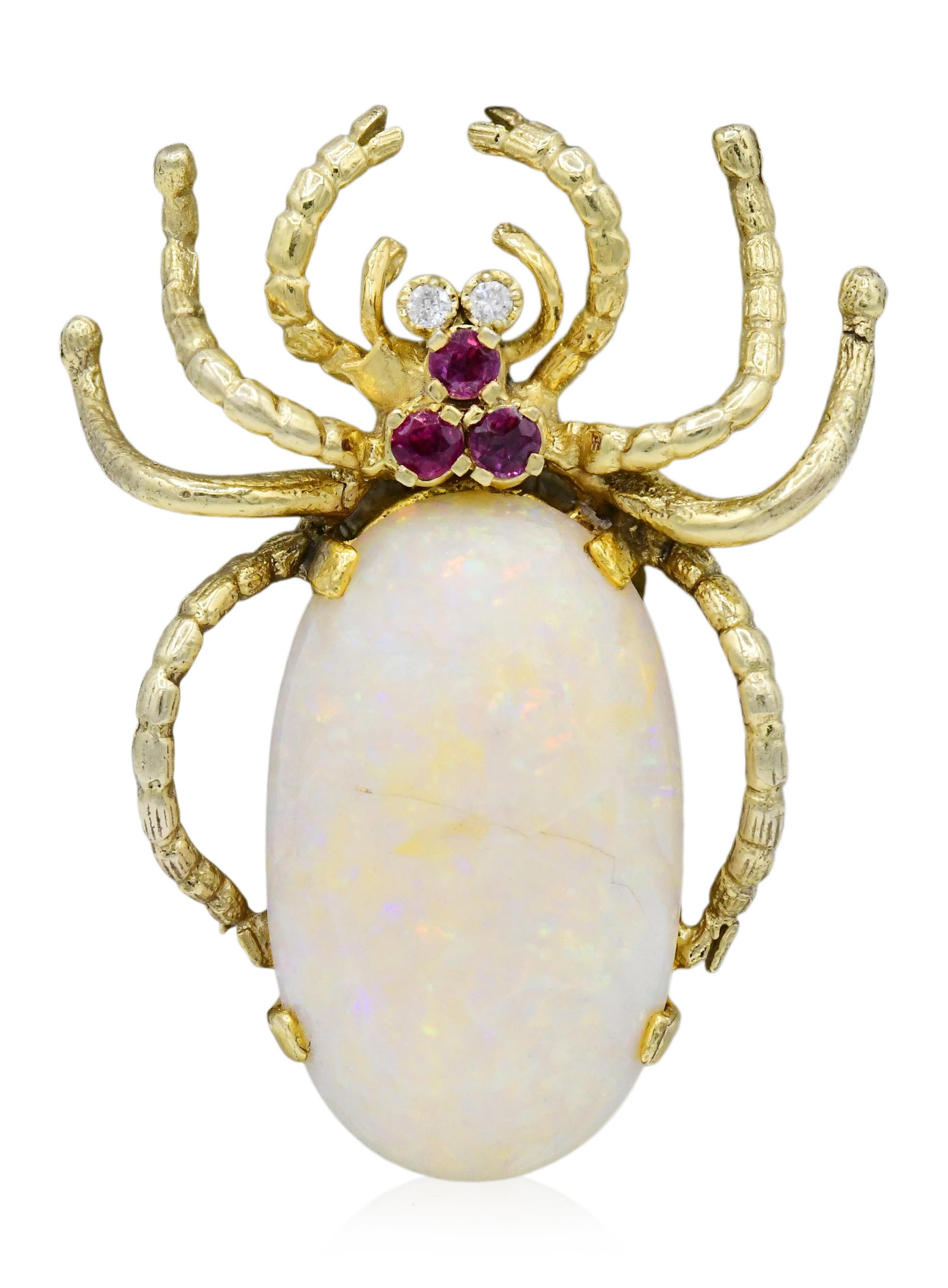 14 Karat Yellow Gold, Opal, Diamond & Ruby Spider Brooch: 14 Karat Yellow Gold, Opal, Diamond & Ruby Spider Brooch • featuring an oval white opal cabochon measuring approximately 27.29 by 16.42 mm • accented by rubies weighing a total of 0.21 car