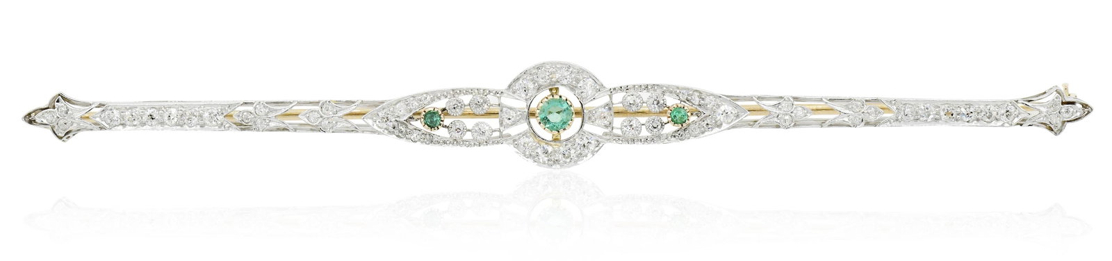Platinum, 14K Yellow Gold, Diamond & Emerald Art Deco Bar Brooch: Platinum, 14K Yellow Gold, Diamond & Emerald Art Deco Bar Brooch • featuring faceted round emeralds weighing a total of 0.28 carats • set throughout with Old European cut diamonds weighing