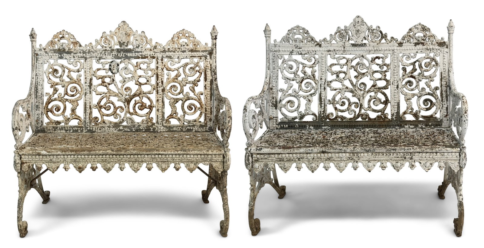 A Pair of American Cast Iron Garden Benches: A Pair of American Cast Iron Garden Benches 19th century 35 x 36 x 20 inches Provenance: Private Collection, Connecticut