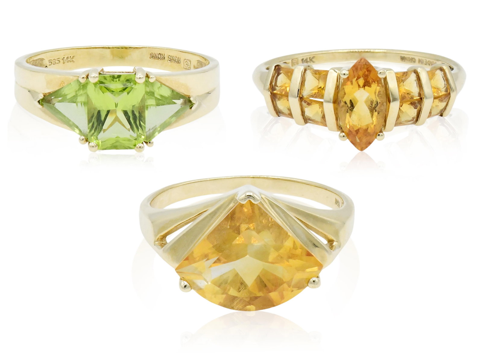 Three 14K Yellow Gold & Gemstone Rings: Three 14K Yellow Gold & Gemstone Rings • two faceted citrine rings, 9 3/4 & 10 1/2 (ring sizes) • one faceted peridot ring, 10 1/4 (ring size) • 7.7 dwt (total lot weight) Provenance