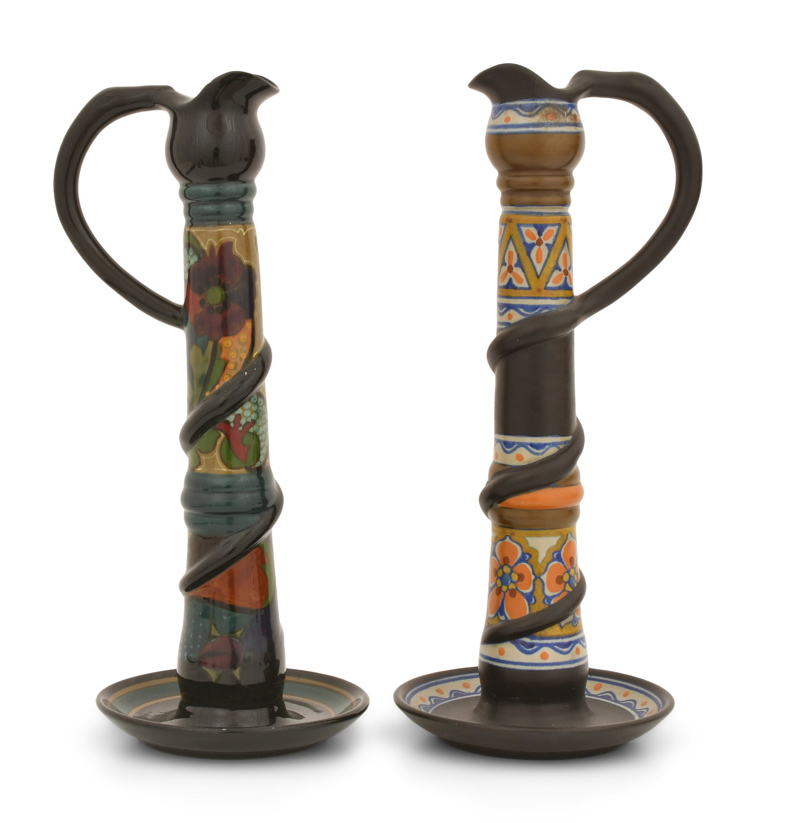 A Pair of Gouda Pottery Ewers, Holland: A Pair of Gouda Pottery Ewers, Holland early 20th century each marked to the underside 15 1/2 x 6 1/4 inches Provenance: Private Collection, Buffalo, New York