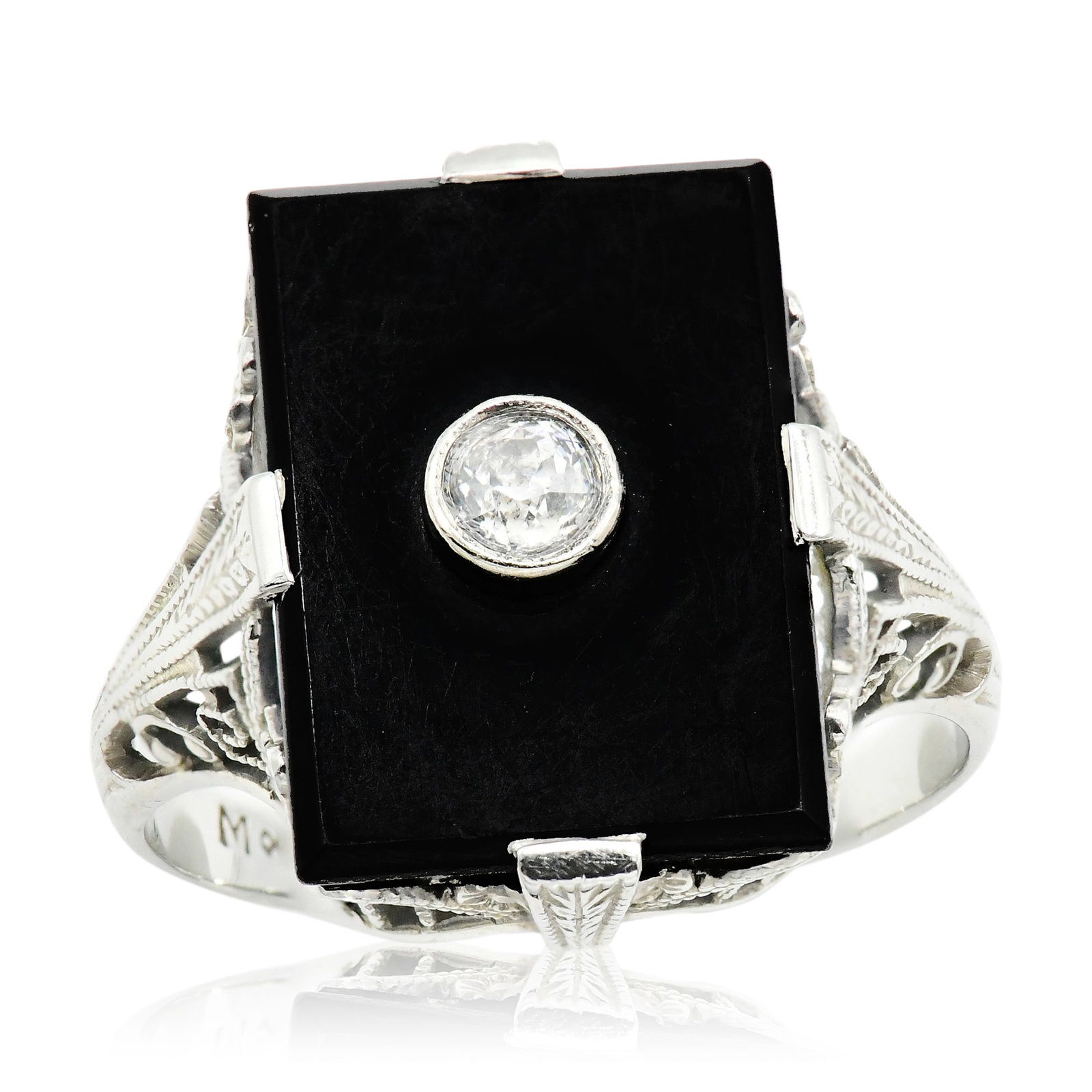 18K White Gold, Black Onyx & Diamond Ring: 18K White Gold, Black Onyx & Diamond Ring • featuring a 0.10 carat Old European cut diamond • 3 (ring size) • 1.7 dwt (total weight) Provenance: Private Collection, Maryland Other Notes