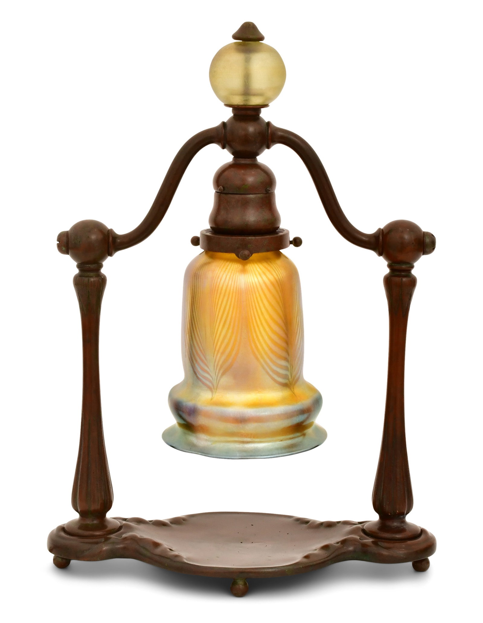 Tiffany Studios "Bell" Table Lamp: Tiffany Studios "Bell" Table Lamp circa 1910 with a "Pulled Feather" shade patinated bronze, favrile glass shade engraved "L.C.T." base impressed "Tiffany Studios, New York, 449, S924" 15 x 10 1/2 x 5