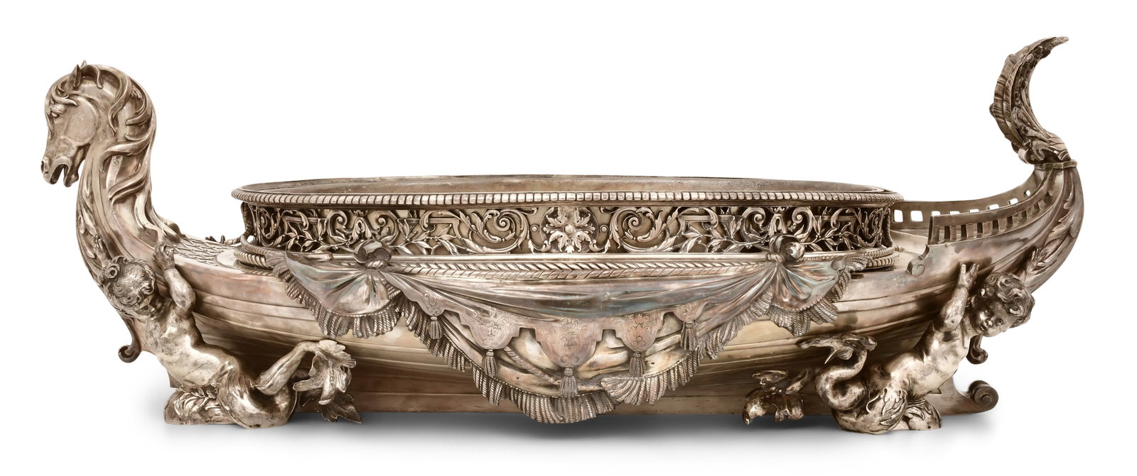 A Monumental Sterling Silver Nautical Centerpiece: A Monumental Sterling Silver Nautical Centerpiece early 20th century modeled as a ship with a horse figurehead, scrollwork and nautical nymphs 15 x 40 1/2 x 20 inches 674.50 troy ounces
