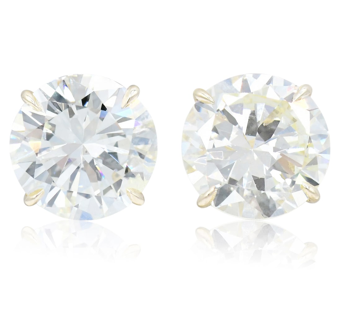 14K Yellow Gold & 4.38 Carat Diamond Stud Earrings: 14K Yellow Gold & 4.38 Carat Diamond Stud Earrings • 2.19 carat round brilliant diamond with VS2 clarity, M color, Very Good cut and Medium fluorescence • 2.19 carat round brilliant