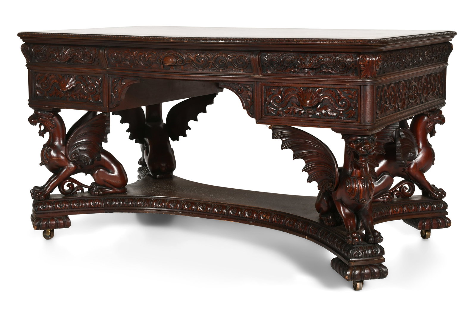 R.J. Horner & Co. Partner's Desk with Winged Griffins: R.J. Horner & Co. (New York, 1886-1915) Partner's Desk with Winged Griffins circa 1890 carved mahogany with paper label "Highest Grade Solid Mahogany, No Veneers Used" 31 x 56 x 37 inches