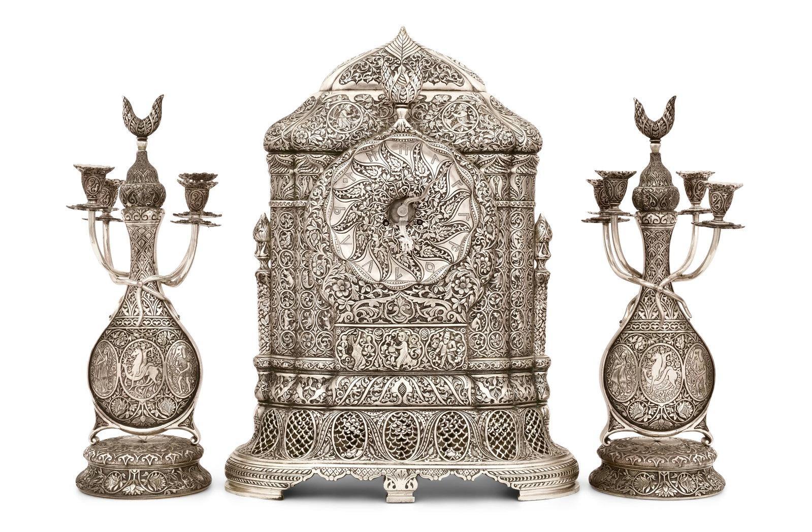A Fine French "Moorish" Silvered Bronze Clock Garniture: A Fine French "Moorish" Silvered Bronze Clock Garniture late 19th century 25 x 18 1/2 x 9 inches (clock) 21 1/2 x 8 x 8 inches (side pieces)