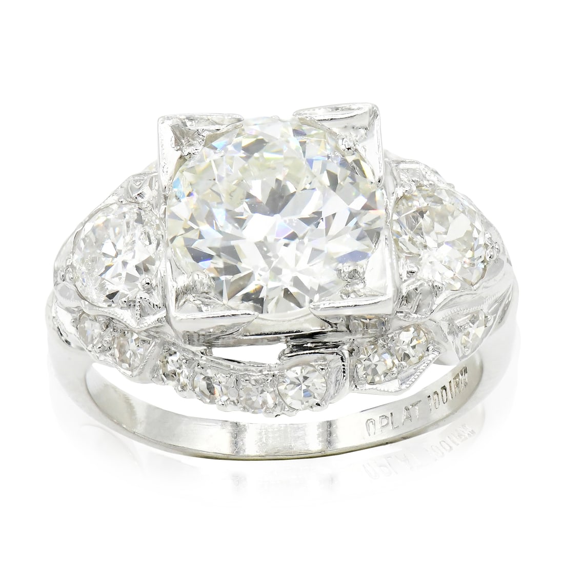 Platinum & 2.97 Carat Diamond Ring: Platinum & 2.97 Carat Diamond Ring • featuring a 2.00 carat Old European cut diamond with SI2 clarity, L color and Strong fluorescence • flanked by Old European cut diamonds weighing a