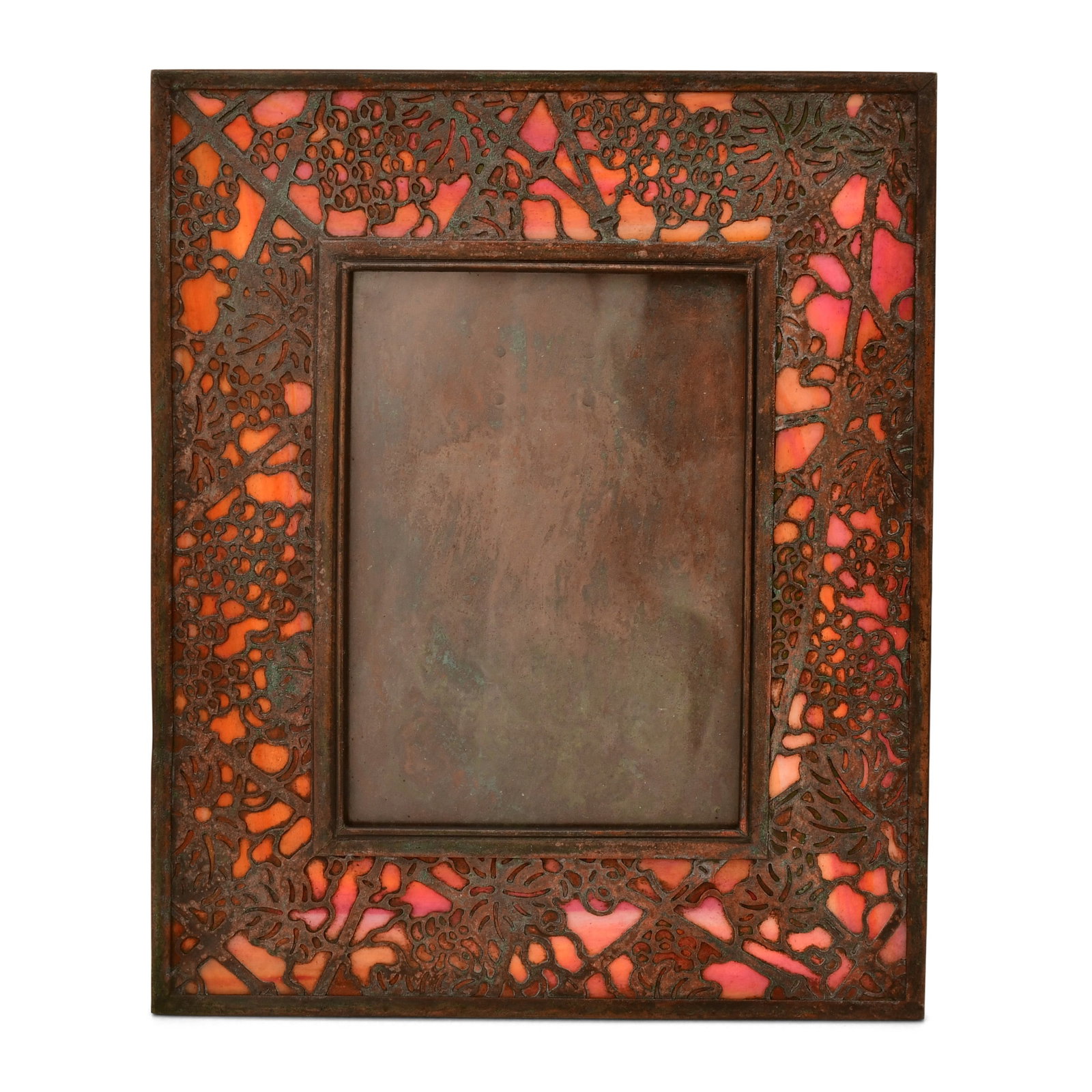 Tiffany Studios "Grapevine" Picture Frame: Tiffany Studios "Grapevine" Picture Frame circa 1910 favrile glass, patinated bronze impressed "Tiffany Studios, New York, 947" 9 x 7 1/2 inches Provenance: Property from a Massachusetts Collector