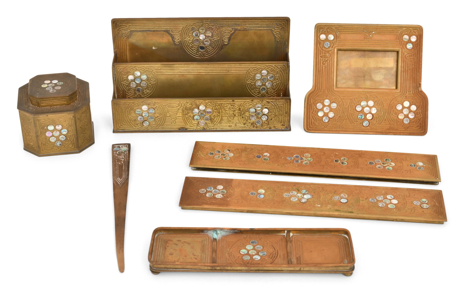 Tiffany Studios Six-Piece "Abalone" Desk Set: Tiffany Studios Six-Piece "Abalone" Desk Set circa 1915 gilt bronze, abalone inlay comprising an inkwell, letter rack, frame, letter opener, pen tray and blotter ends each impressed "Tiffany Studios, 