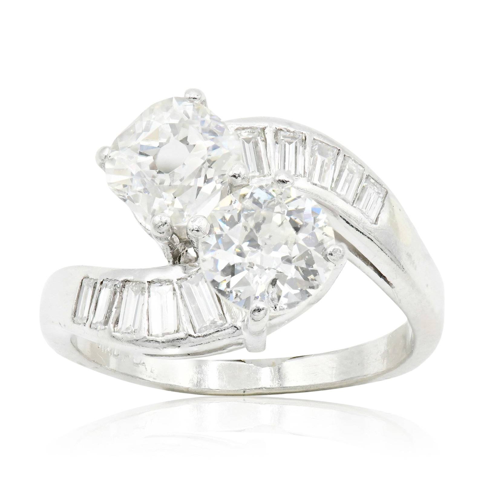 Platinum & Diamond Art Deco Toi Et Moi Bypass Ring: Platinum & Diamond Art Deco Toi Et Moi Bypass Ring • featuring a 1.01 carat Old mine cushion cut diamond with VS2 clarity, I color and no fluorescence • accompanying a 1.00 carat Old