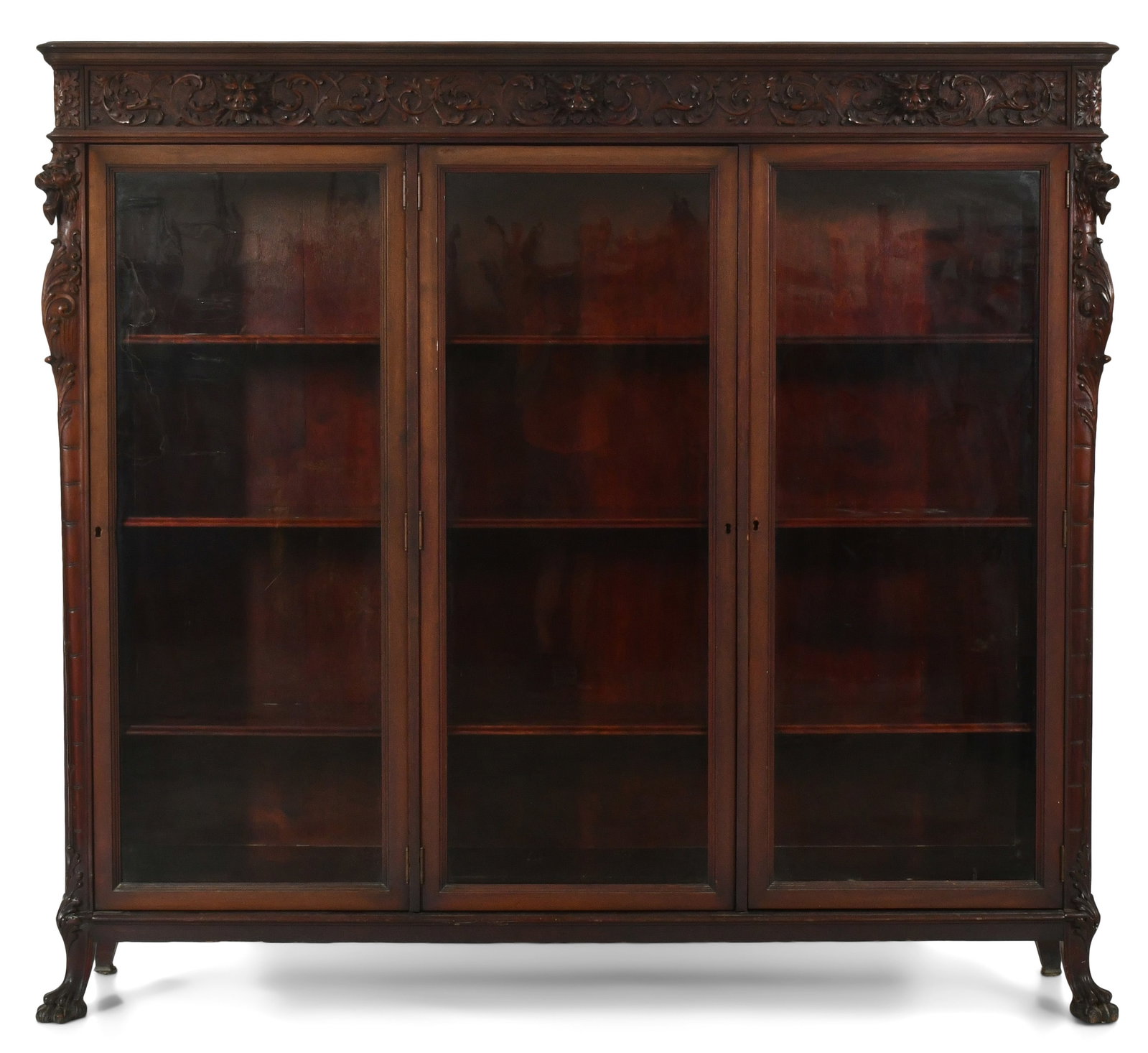George C. Flint Co. Three-Door Bookcase: George C. Flint Co. Three-Door Bookcase circa 1900 carved mahogany signed with firm's label and numbered "2018" 65 x 73 x 16 inches