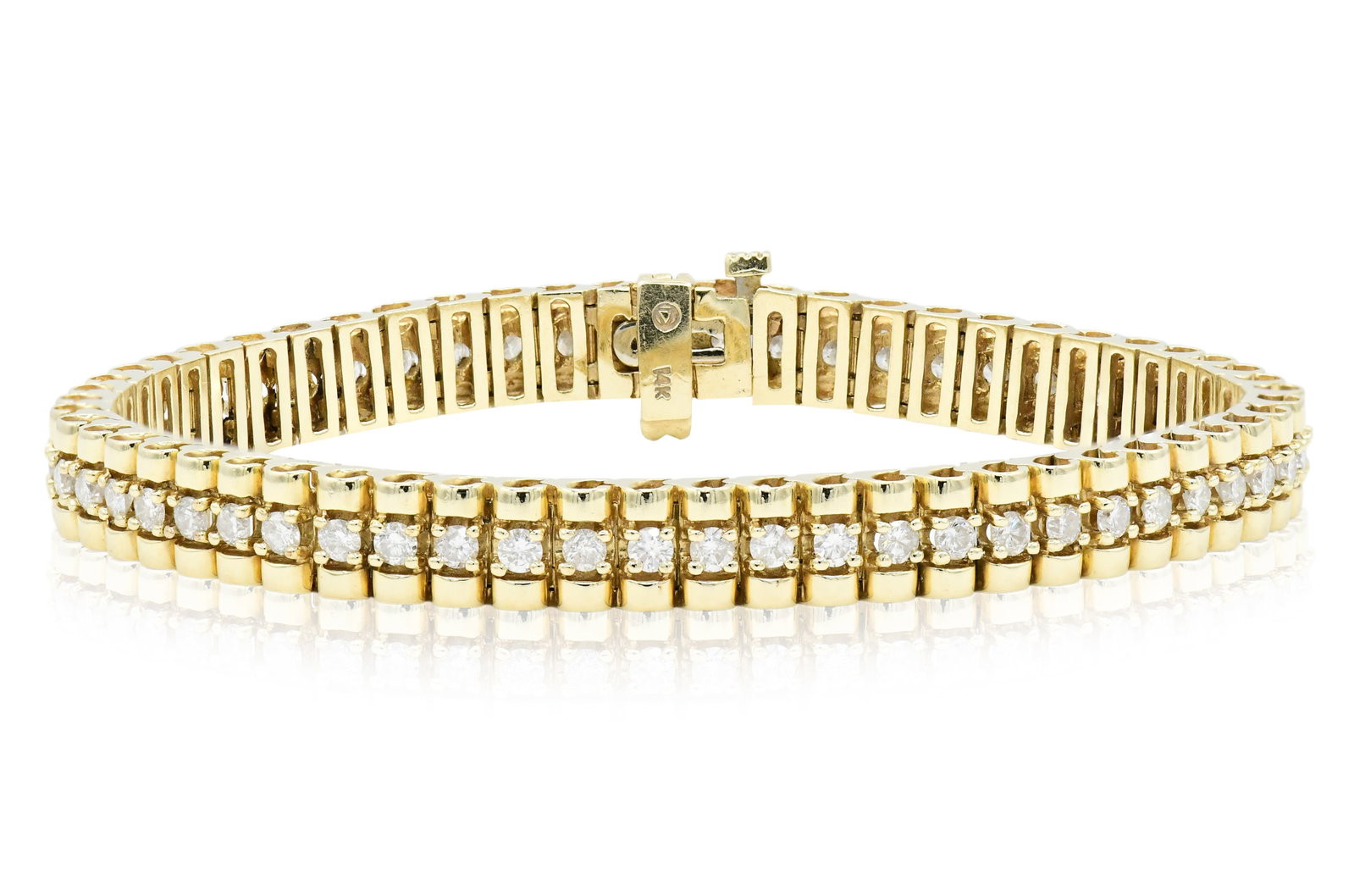 14K Yellow Gold & Diamond Tennis Bracelet: 14K Yellow Gold & Diamond Tennis Bracelet • set with round brilliant diamonds weighing a total of 2.57 carats • 7 3/8 inches (length) • 15.3 dwt (total weight) Provenance: Important