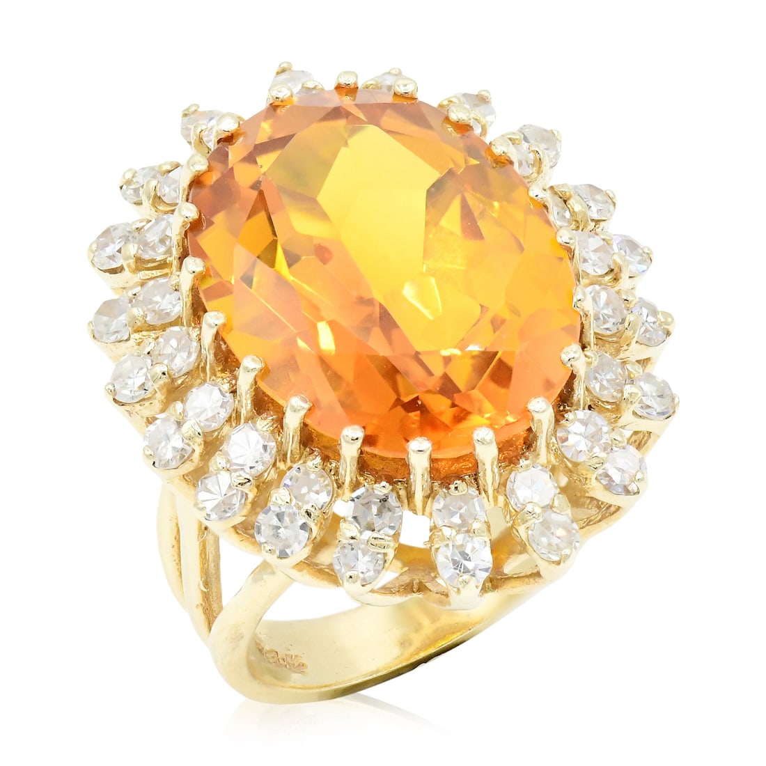 14K Yellow Gold, Diamond & Citrine Cocktail Ring: 14K Yellow Gold, Diamond & Citrine Cocktail Ring • featuring a 15.15 carat faceted oval citrine • accented by single cut diamonds weighing a total of 1.60 carats • 6 (ring size) R