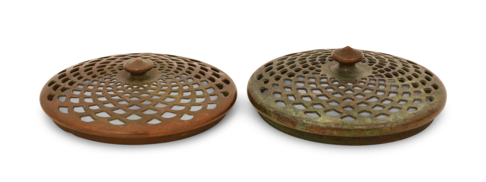 Tiffany Studios, Two Slip Heat Caps: Tiffany Studios Two Slip Heat Caps circa 1910 patinated bronze 3 1/2 in. diameter Provenance: Important Private Collection Other Notes: Fontaine's Auction Gallery can arrange shipping for this item (U