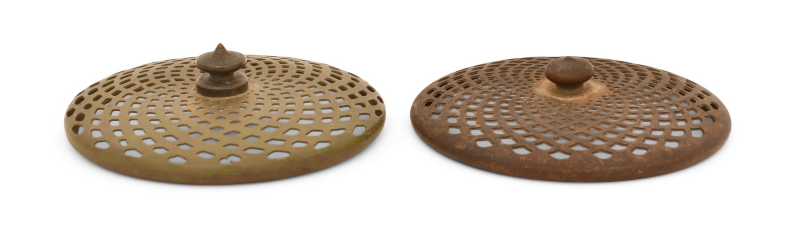 Tiffany Studios, Two Heat Caps: Tiffany Studios Two Heat Caps circa 1910 patinated bronze 4 in. diameter Provenance: Important Private Collection Other Notes: Fontaine's Auction Gallery can arrange shipping for this item (USA only).