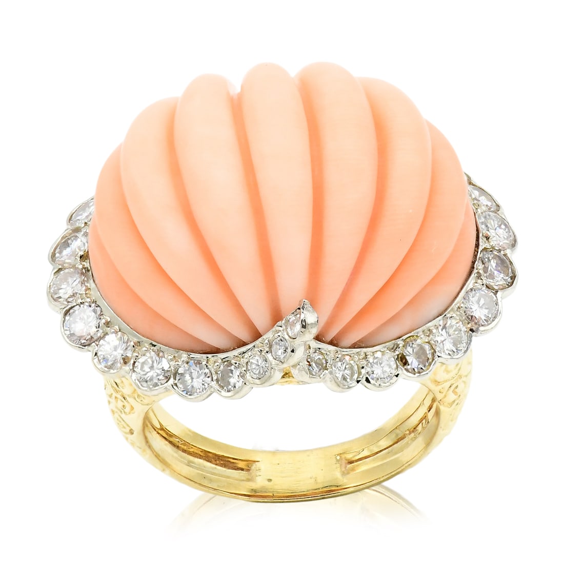 18K Yellow Gold, White Gold, Diamond & Angel Coral Cocktail Ring: 18K Yellow Gold, White Gold, Diamond & Angel Coral Cocktail Ring • featuring a carved angel coral cabochon measuring approximately 23.03 x 17.10 mm • accented by round brilliant diamonds w