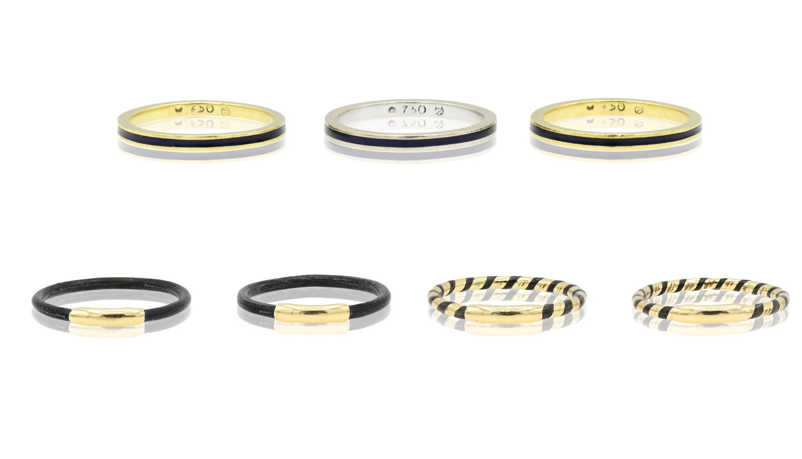 Hidalgo Group of 18K Yellow Gold & Enamel Ring Bands: Hidalgo Group of 18K Yellow Gold & Enamel Ring Bands • 6 1/2 (largest ring size) • 4.6 dwt (total lot weight) Provenance: Private Collection, Massachusetts Other Notes: Fontaine's Auction