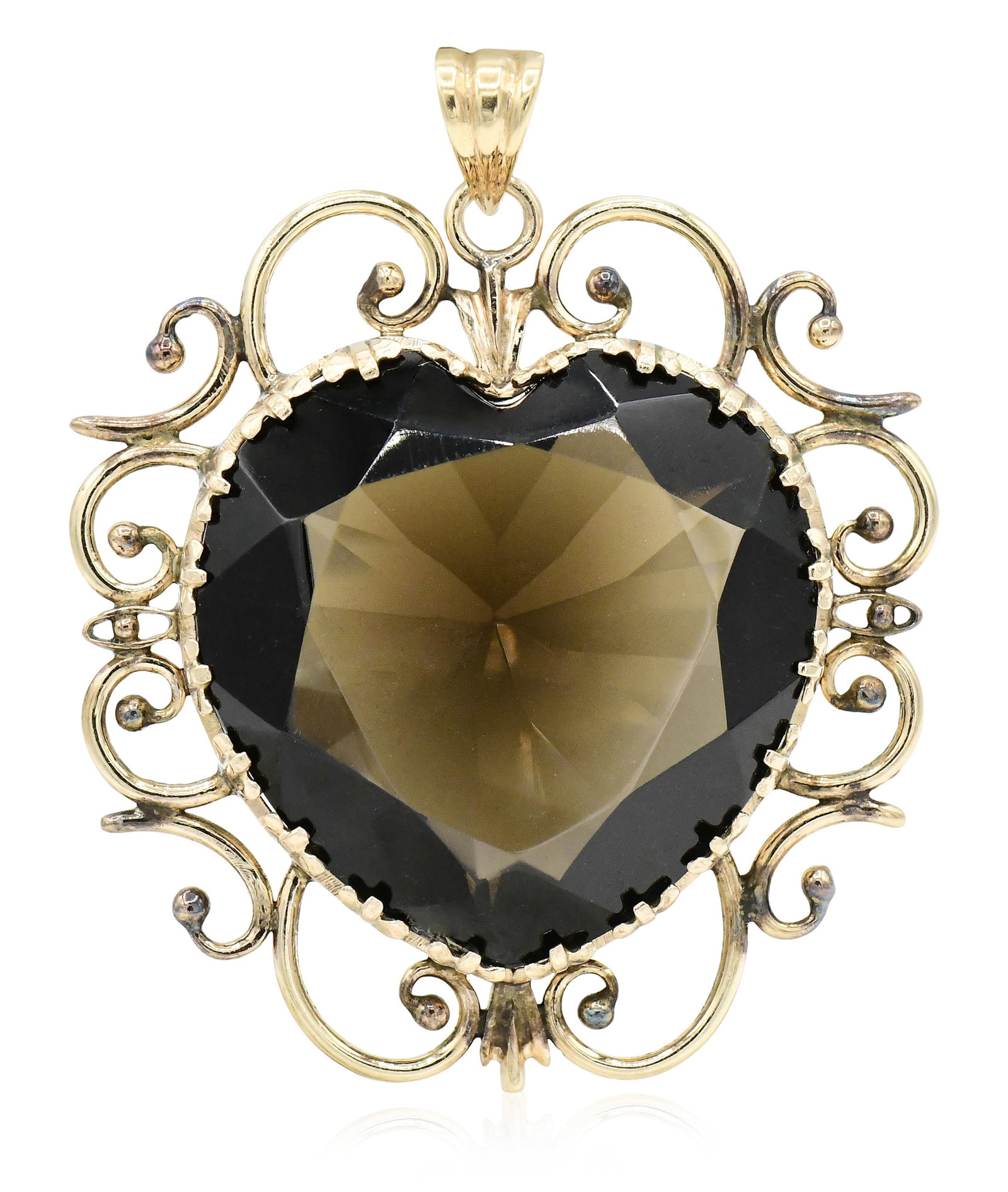 9K Yellow Gold & Smoky Quartz Heart Pendant: 9K Yellow Gold & Smoky Quartz Heart Pendant • featuring a 54.16 carat faceted heart shaped smoky quartz • 2 inches (length) • 12.3 dwt (total weight) Provenance: Important Private Co