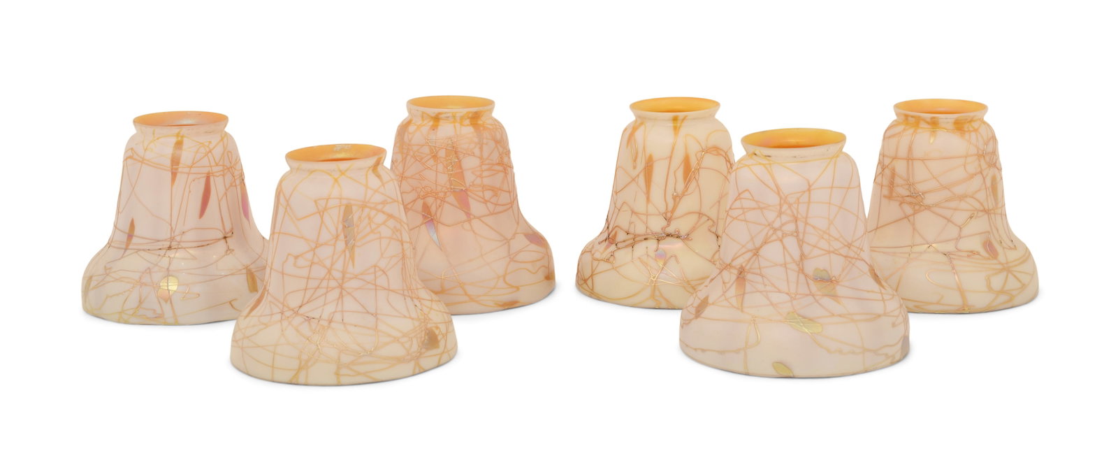 Set of Six Steuben Glass "Hearts and Vines" Shades: Steuben Glass Works (Corning, New York, est. 1930) Set of Six "Hearts and Vines" Shades early 20th century iridescent glass one signed with fleur-de-lis mark 4 x 5 inches Provenance: Private Collec