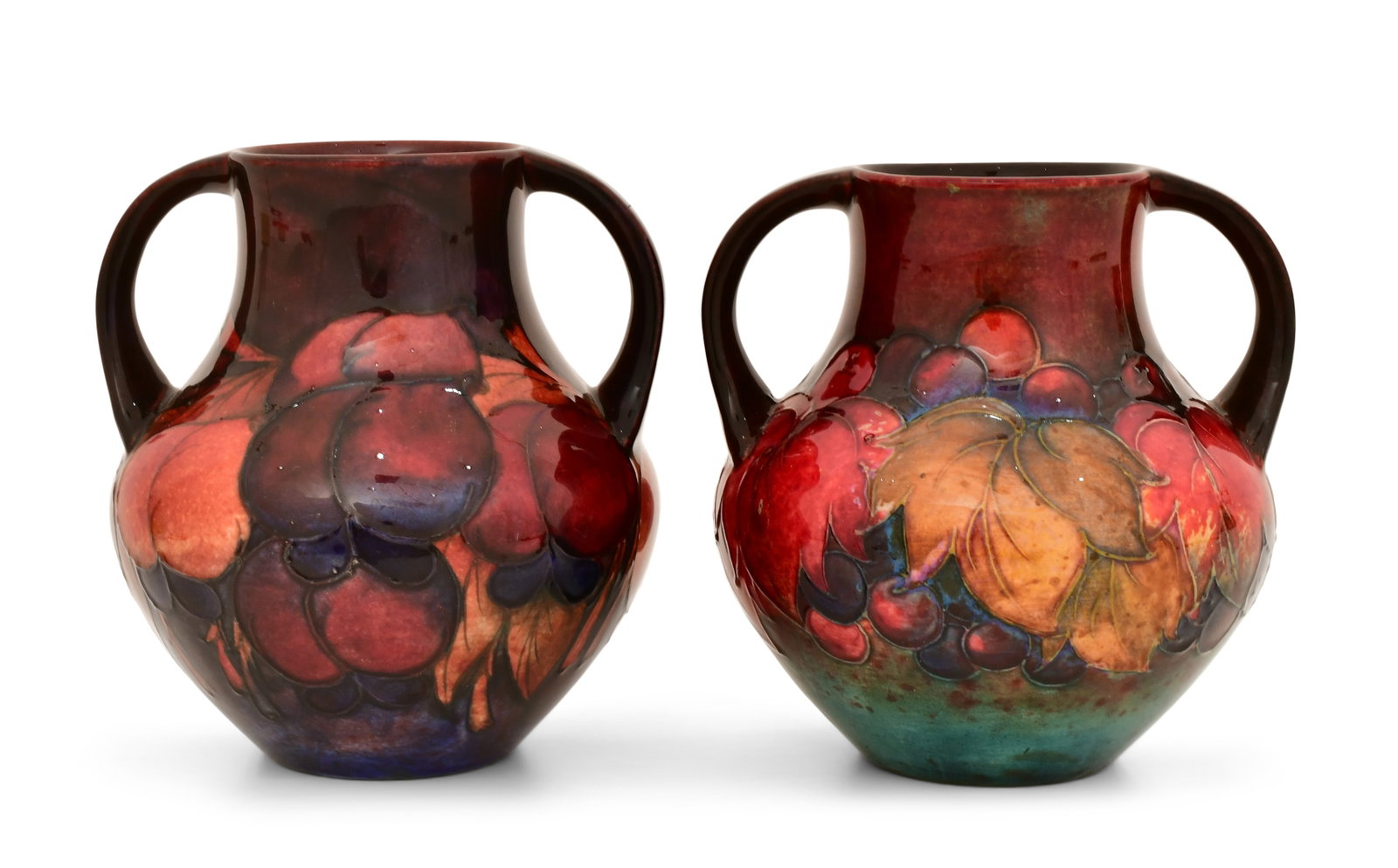 Two Moorcroft Pottery Flambe Floral Vases: Two Moorcroft Pottery Flambe Floral Vases early 20th century each signed to the underside 5 x 4 3/4 inches Provenance: Private Collection, Connecticut