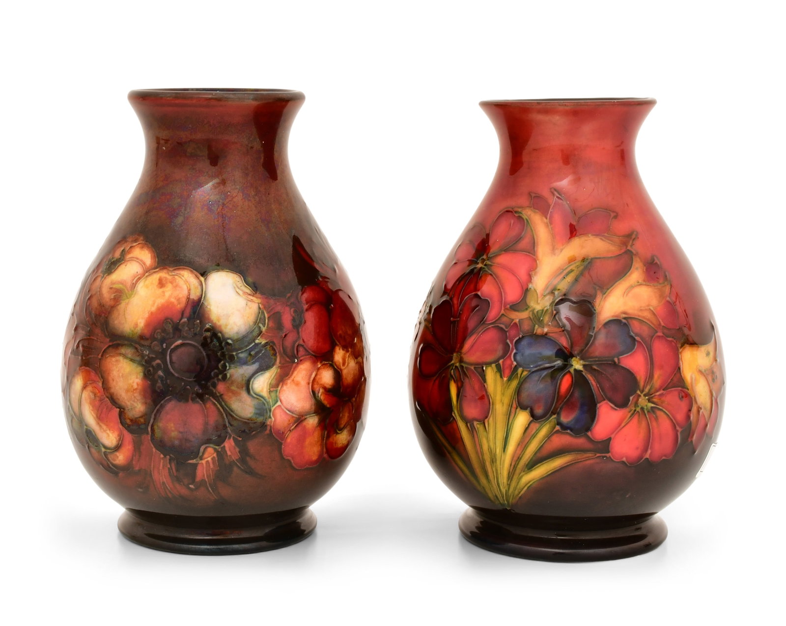 Two Moorcroft Pottery Flambe Floral Vases: Two Moorcroft Pottery Flambe Floral Vases early 20th century each signed to the underside 6 x 4 1/4 inches Provenance: Private Collection, Connecticut