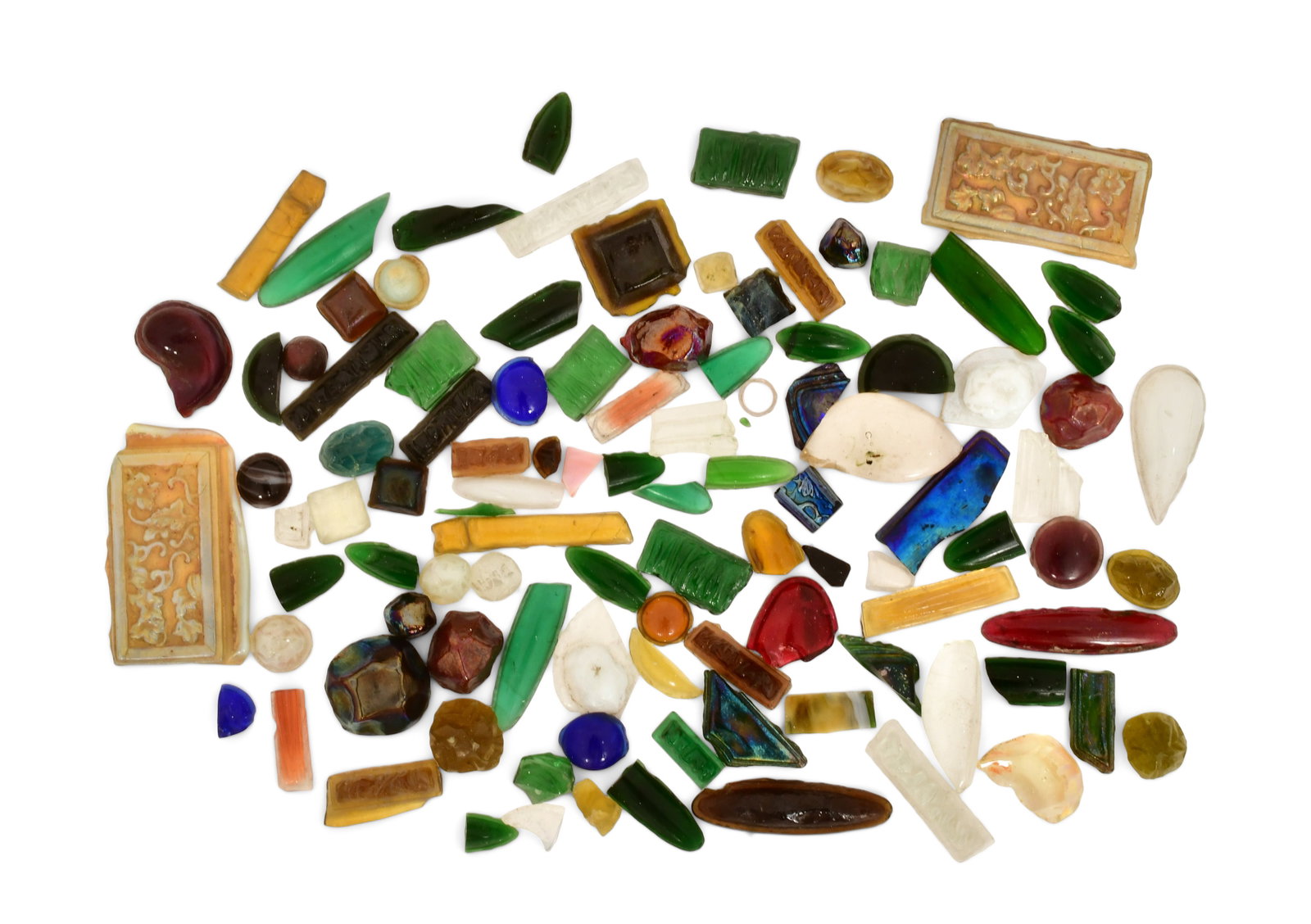 Tiffany Studios, Collection of Glass Jewels, Tiles & Fragments: Tiffany Studios Collection of Glass Jewels, Tiles & Fragments circa 1910 favrile glass 3 3/4 x 2 inches (largest) Provenance: Private Collection, New York Other Notes: Fontaine's Auction Gallery can