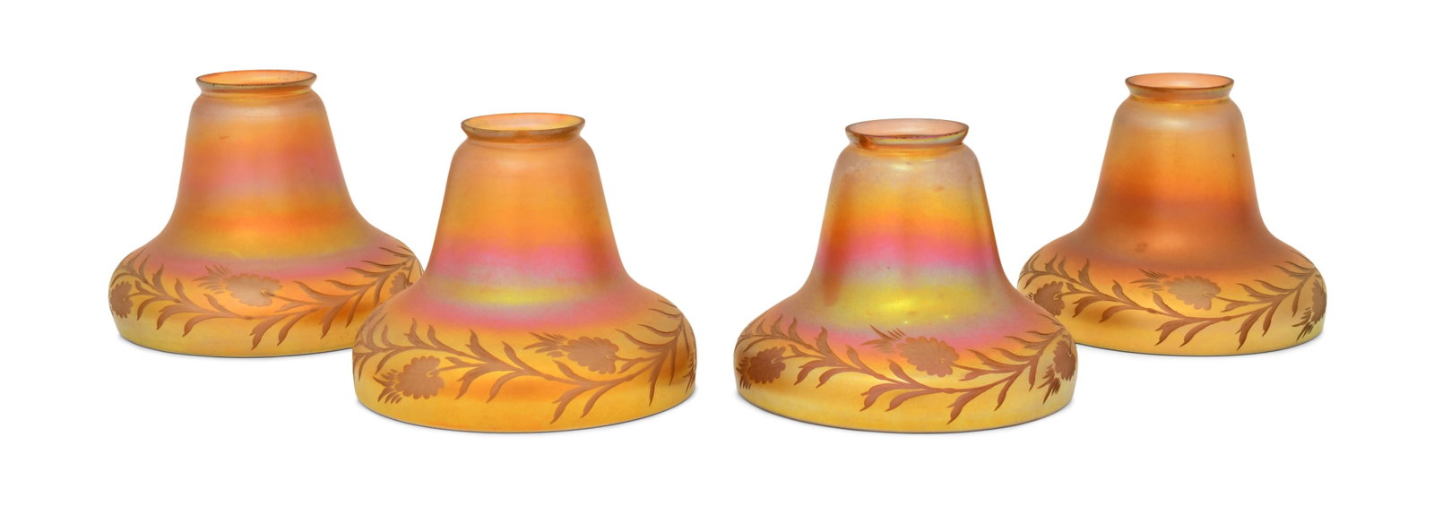 Set of Four Steuben Intaglio Carved Glass Shades: Steuben Glass Works (Corning, New York, est. 1930) Set of Four Intaglio Carved Shades early 20th century iridescent glass each signed with fleur-de-lis mark 4 1/2 x 6 inches Provenance: Private Col