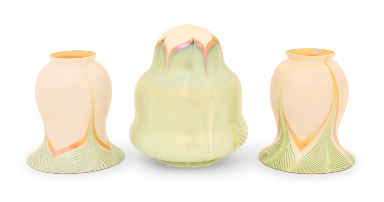 A Quezal Art Glass "Pulled Feather" Shade and a Pair of Steuben Art Glass "Pulled Feather" Shades: A Quezal Art Glass "Pulled Feather" Shade and a Pair of Steuben Art Glass "Pulled Feather" Shades early 20th century the large shade signed "Quezal" and one Steuben shade with firm's mark 5 1/2 x 5 in
