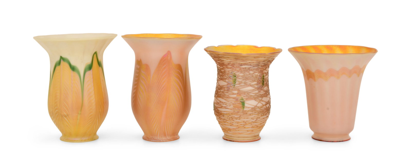 Four Quezal Art Glass Decorated Shades: Quezal Art Glass and Decorating Company (New York, 1901-1924) Four Decorated Shades circa 1915 iridescent glass each marked "Quezal" 6 x 4 3/4 inches (larger) Provenance: Private Collection, Maryla