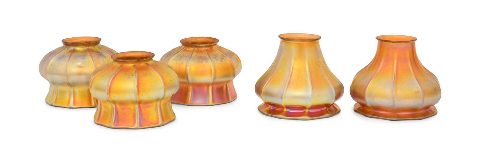 Five Steuben Glass Shades: Steuben Glass Works (Corning, New York, est. 1930) Five Shades early 20th century iridescent glass each signed with fleur-de-lis mark 4 x 5 1/2 inches Provenance: Private Collection, Tennessee