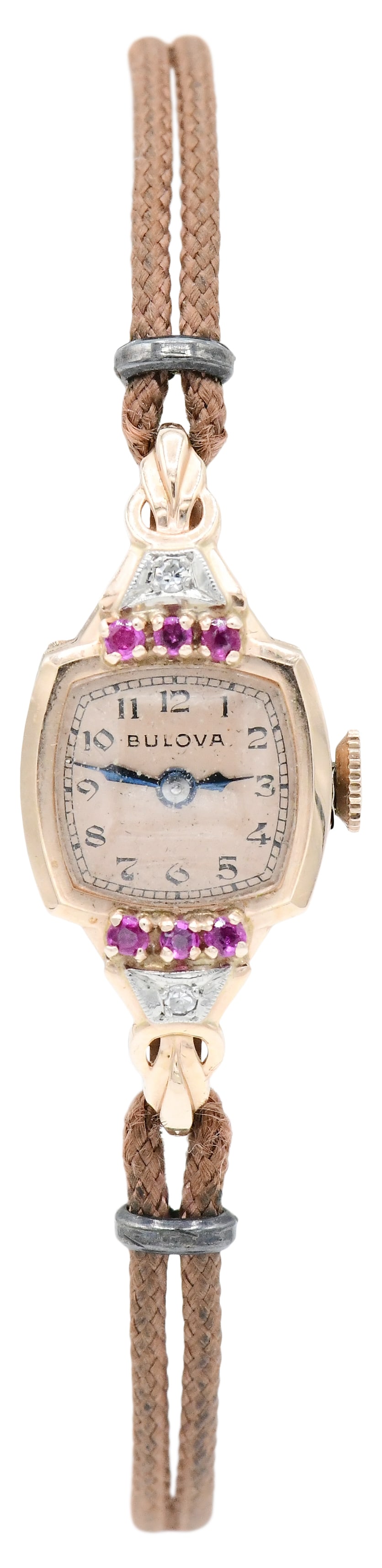 Bulova 14K Rose Gold, Diamond & Ruby Ladies Wristwatch: Bulova 14K Rose Gold, Diamond & Ruby Ladies Wristwatch Case: 14K rose gold, 17 x 15 mm, No. 525532 Gemstones: single cut diamonds weighing a total of 0.03 carats, faceted round rubies weighing a total