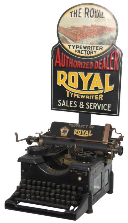 Royal Typewriter Advertising Display: Royal Typewriter Advertising Display. The Royal Number 10 typewriter was first produced in 1914, has a black painted body with gold lettering and Royal decal with 2 beveled glasses on either side. Nic