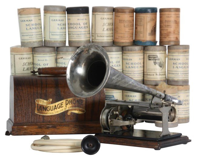 Columbia Type Q, “The Language Phone”: Columbia Type Q, “The Language Phone” Phonograph. Domed oak lid and oak platform with black painted base plate and nickel frame plates; the lid is signed with a banner decal for “The Language Ph