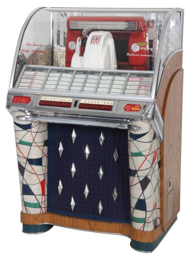 Seeburg Model 100W Jukebox - 1953: Seeburg Model 100W Jukebox - 1953. The large curved glass front lid exposes the working mechanics to the Select-O-Matic 100, playing 45’s, has red and white painted covers and a mosaic mirror tiled