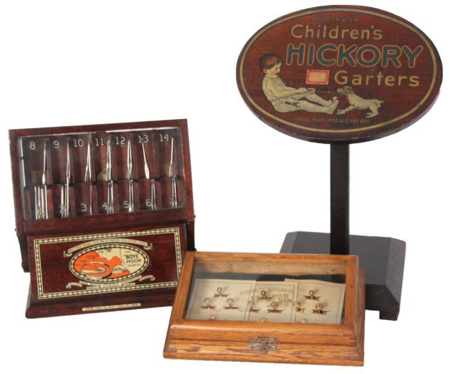 3 Pcs. Sewing Display Advertising: 3 Pcs. Sewing Display Advertising. Boye Hook counter top store display advertising display, has a drop front door with 14 numbered slots for hooks and decal on the front, measures 8 in. high x 8 in. w