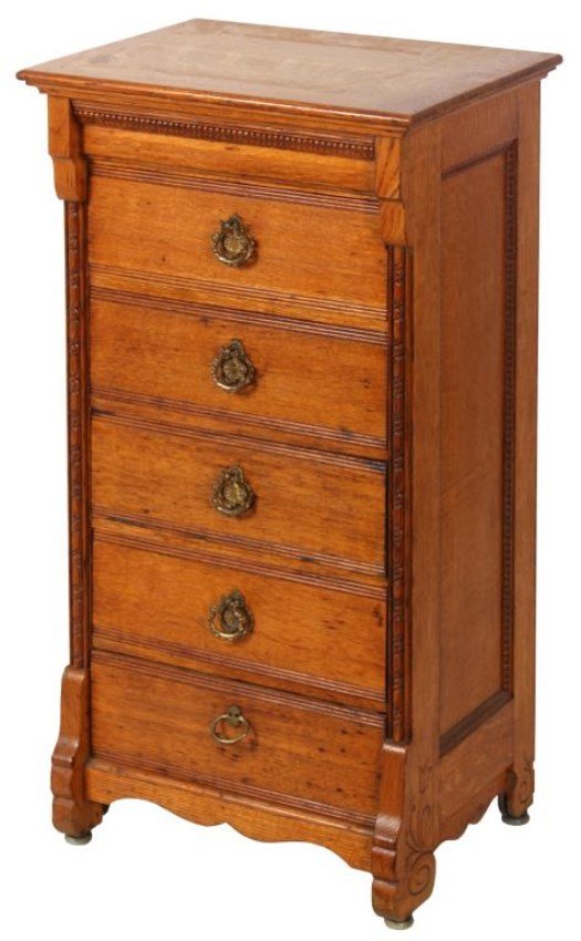 Oak 5 Dwr. Cylinder Phonograph Record Cabinet: Oak 5 Dwr. Cylinder Phonograph Record Cabinet. Overhanging top with carved moldings at the frieze, along the sides and bordering the inset side panels; 5 drawers with brass pulls (1 replaced), contain