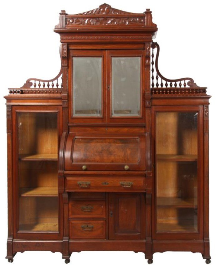 Walnut Cylinder Double Side By Side Secretary: Large Burled Walnut Cylinder Double Side By Side Secretary. Features a center crest carved with seashells, flowing filigree and bellflowers. The center section has floral and leaf carved moldings arou