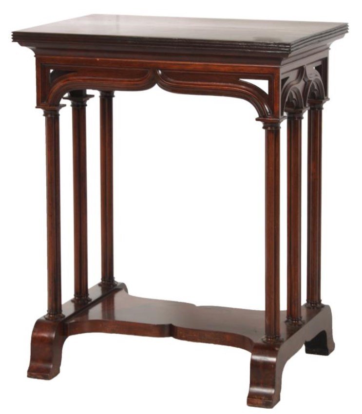 Gothic Carved Mahogany Side Table: Gothic Carved Mahogany Side Table. The flat rectangular top has a ribbed edge with wavy arched apron having pierced corners and 3 cluster column supports on the sides, on a shoe-foot base with carved