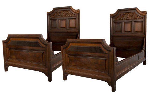 Pr. Rosewood Carved & Paneled Twin Beds: Pr. Rosewood Carved & Paneled Twin Beds attr. Herter Bros. Each headboard has a squared crest, arching at the edges with scrolled leaf carvings. The top panel has deep relief carving scrolled with det