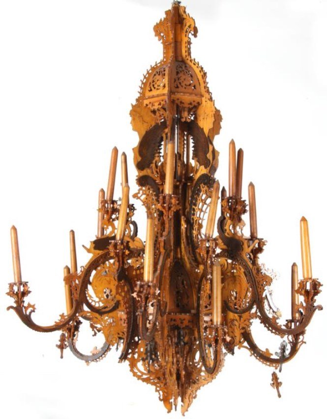 Lg. Pierced Carved Tramp Art Chandelier: Large 12 arm, 24 light chandelier has a fancy carved center with 12 corbelled arms scrolling out with candle holders at the top, dropping down and curving back up with candle holders at the ends. Nice