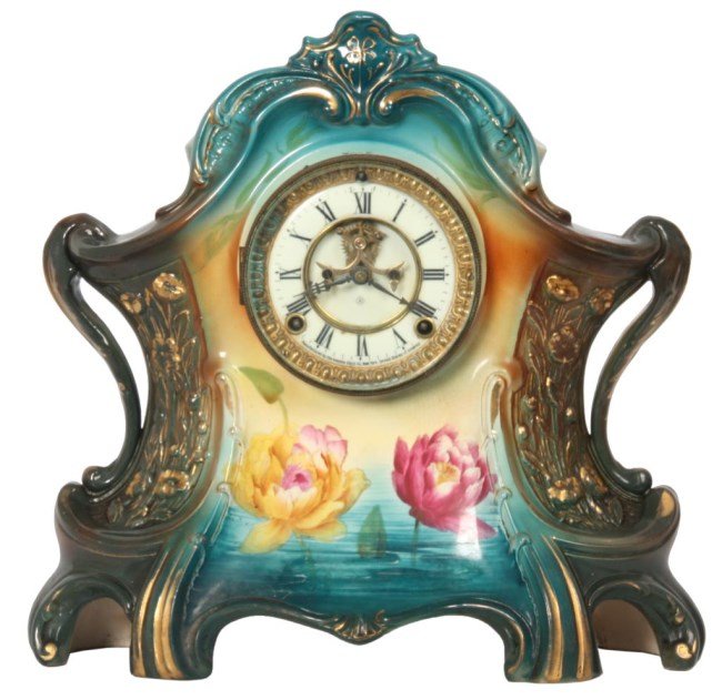 Ansonia Royal Bonn China Clock “La Layon”: Ansonia Royal Bonn China Clock “La Layon”. 4 in. porcelain inset dial has black hands, exposed Brocot escapement and fancy gilt brass bezel with door glass; brass 8 day spring driven movement sign