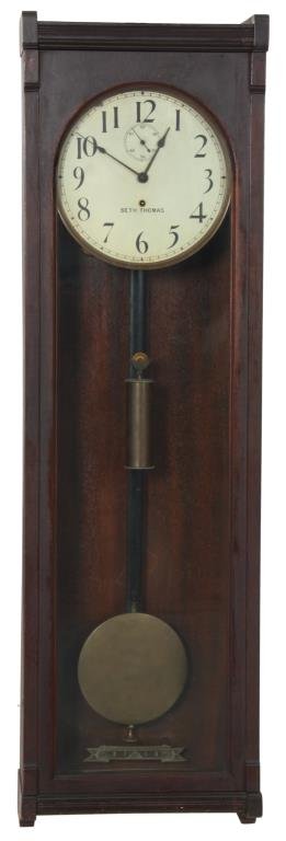 Seth Thomas Regulator No. 11: Seth Thomas No. Wall Hanging Regulator Clock. Original 12 in. painted metal dial has black hour numbers, sub seconds dial, original spade hands, brass bezel and signed Seth Thomas; brass 8 day weight