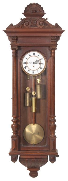 3 Weight Vienna Regulator Clock: 3 Weight Vienna Regulator Clock. 6.5 in. inset porcelain dial with brass bezel, Roman hour numerals and fancy pierced hands; 3 weight driven movement has brass plates, quarter hour Grand Sonnerie stri